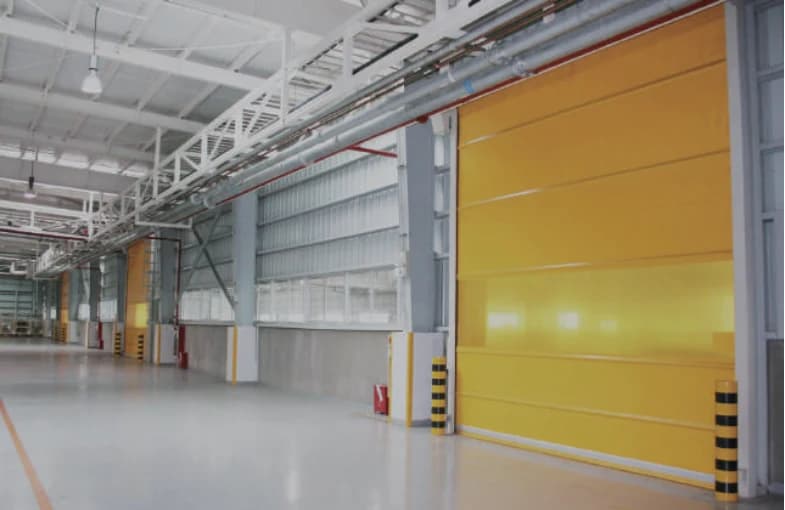 Yellow high-speed PVC door in an industrial building — supplier catalogue illustration