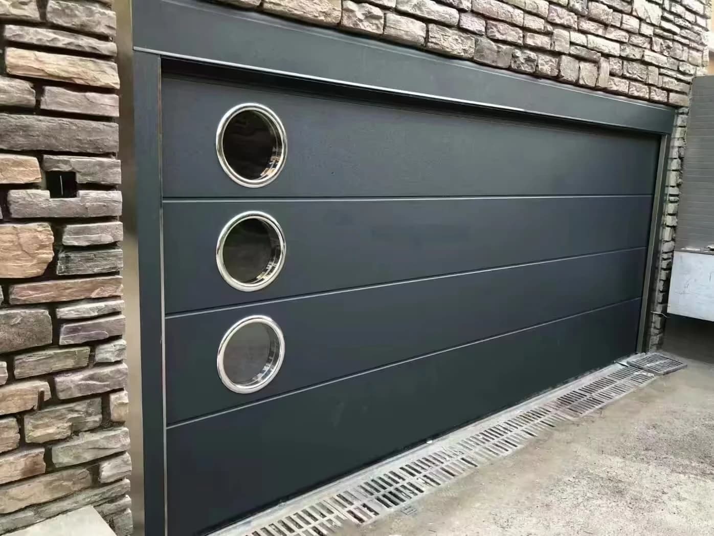 Dark sectional panels with round windows